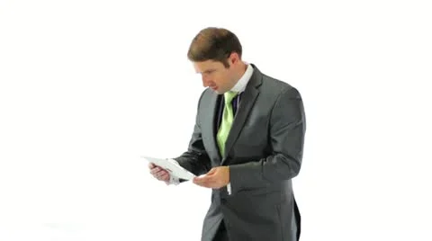 Fear Businessman Using a Tablet Stock Footage 11854727