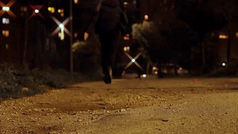 Fear, danger - young man in the park at night runs away from his attacker Stock Footage 151527818