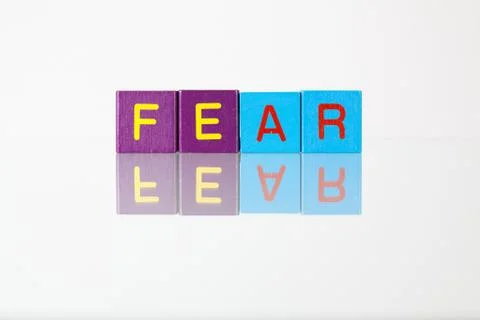 Fear - an inscription from children's blocks Stock Photos