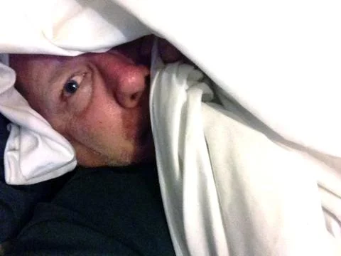 Fear in a sheet 스톡 사진