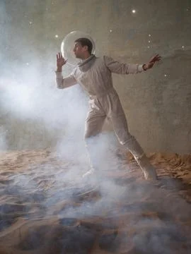 Fear of the unknown on alien planets. An astronaut in a white spacesuit Stock Photos