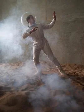 Fear of the unknown on alien planets. An astronaut in a white spacesuit Stock Photos