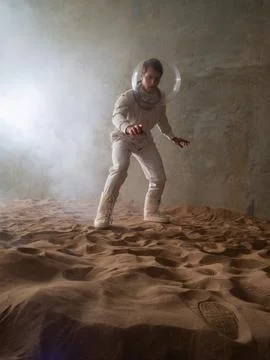 Fear of the unknown on alien planets. An astronaut in a white spacesuit Stock Photos