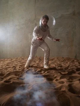 Fear of the unknown on alien planets. An astronaut in a white spacesuit Stock Photos