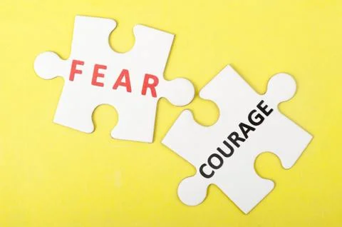 Fear versus courage Stock Photos