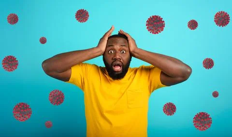 Fearful expression of a boy who is scared to catch the coronavirus. Cyan Stock Photos
