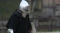 Fearless knight going to the battlefield and expecting his rival. Middle ages HD Footage