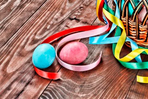 Feast of Easter, painted easter eggs, basket decorated with ribbons 写真素材