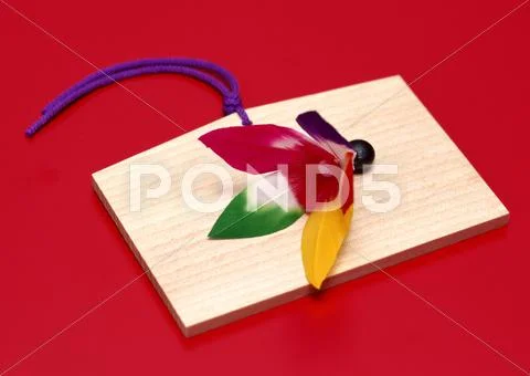 Feather and Votive Picture Stock Photos