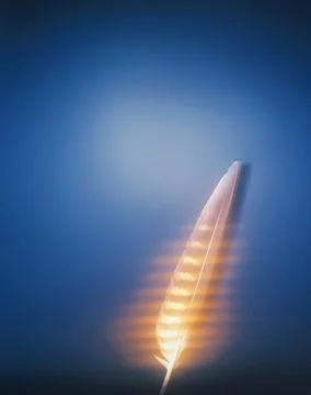 Feather with light streaks on blue background Stock Photos