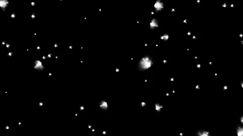 Feather-like particles flying from the center of the screen on a black. Stock Footage 302790983