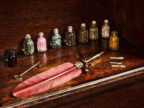 Feather pen and jars Stock Photos