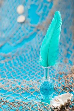 Feather pen in bottle Stock Photos