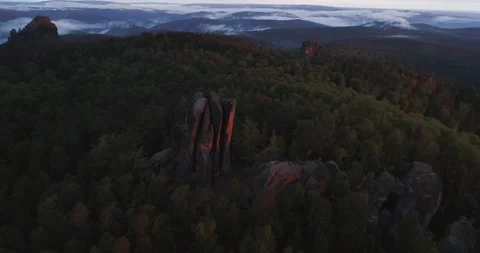 Feather Pillar Cliffs on sunset in national park Krasnoyarskie Stolby Stock Footage 196681496