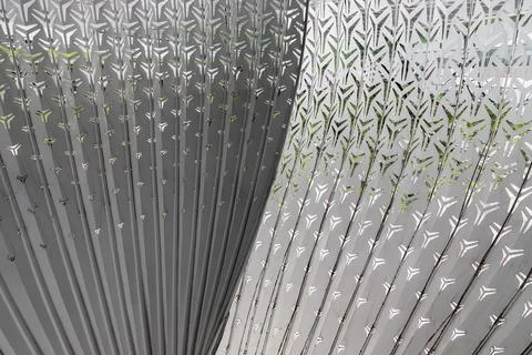 Featuring an intricate, fan-like geometry, the sculpture relies on a centra.. Stock Photos