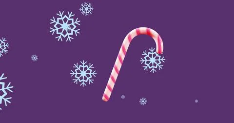 Featuring red white striped candy cane diagonally on purple backdrop, with blue Stock Photos