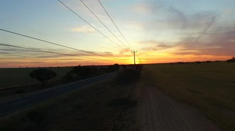  Featuring telegraph poles, power lines and lonely, solitude theme. Driving into Stock Footage 68752383