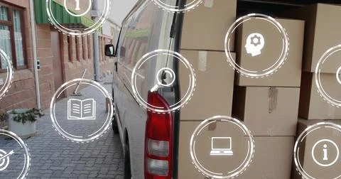 Featuring white cargo van and stacked cardboard boxes occupying narrow service Stock Photos