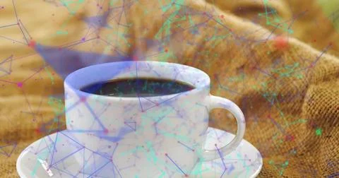 Featuring white ceramic cup filled with black coffee on burlap in rustic cafe Stock Photos