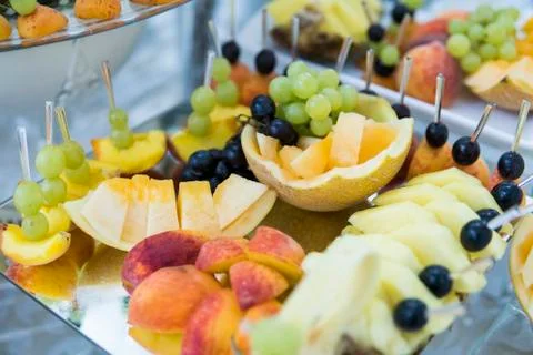 Feautiful fruit buffet served for guests at wedding. Stock Photos