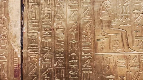 Feb12, 2026, Cairo, Egypt: hieroglyphs, golden sarcophagus of  Egyptian pharaoh Stock Footage 345845790