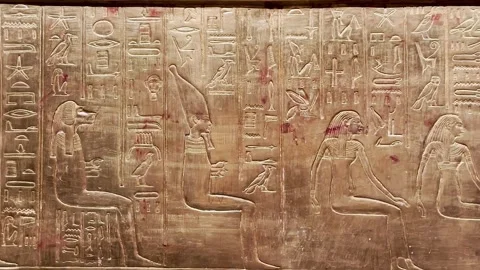Feb12, 2026, Cairo, Egypt: hieroglyphs, golden sarcophagus of  Egyptian pharaoh Stock Footage 345845859