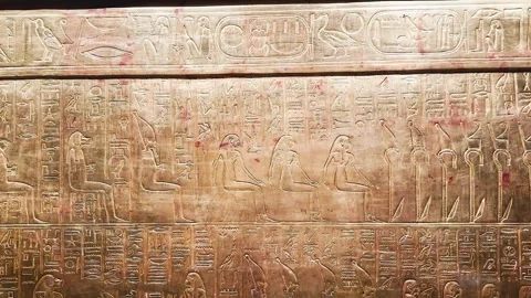 Feb12, 2026, Cairo, Egypt: hieroglyphs, golden sarcophagus of  Egyptian pharaoh Stock Footage 345845881