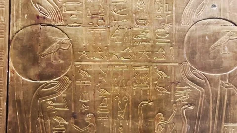 Feb12, 2026, Cairo, Egypt: hieroglyphs, golden sarcophagus of  Egyptian pharaoh Stock Footage 345846064