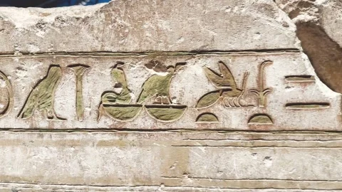 Feb12, 2026, Cairo, Egypt: a wall with ancient Egyptian hieroglyphs Stock Footage 345844029
