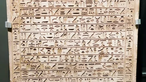 Feb12, 2026, Cairo, Egypt: a wall with ancient Egyptian hieroglyphs Stock Footage 345846167