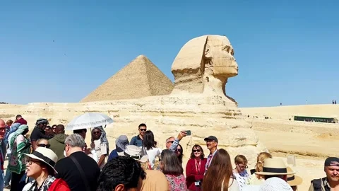 Feb12, 2026, Egypt, Cairo: The Great Sphinx guards the pyramids Stock Footage 339296720