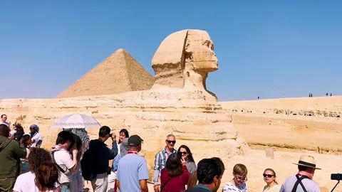 Feb12, 2026, Egypt, Cairo: The Great Sphinx guards the pyramids Stock Footage 339297455