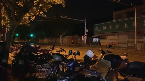 February 25, 2023, Shanghai, Empty vegetable market, bicycles on  roadside 스톡 동영상 300308372