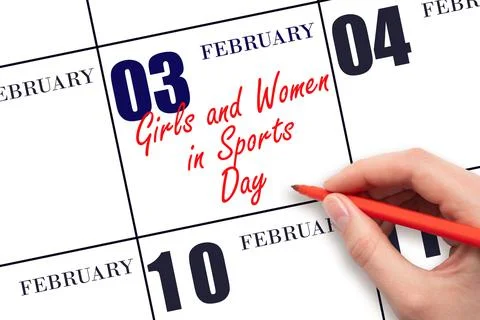 February 3. Hand writing text Girls and Women in Sports Day on calendar date. Stock Photos