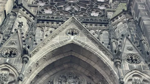 February 4, 2025 - Clermont-Ferrand, France - Cathedral exterior during daylight Stock Footage 338147172