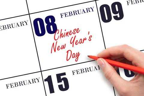 February 8. Hand writing text Chinese New Year's Day on calendar date. Save t Stock Photos