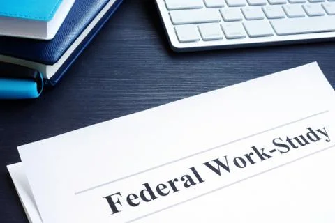Federal Work Study FWS program documents and pen. 스톡 사진