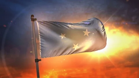 Federated States of Micronesia Flag Backlit At Beautiful Sunrise Loop Slow Mo Stock Footage 76591620