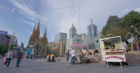 Federation Square timelapse with St Paul's Cathedral and food cart Stock Footage 85246395