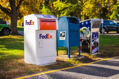 FedEx Collection Boxes and USPS Mailbox at Curb Stock Photos