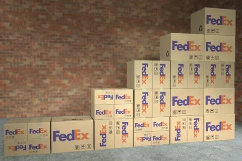 FEDEX logo on cartons with goods composing a rising bar chart. Editorial Stock Illustration