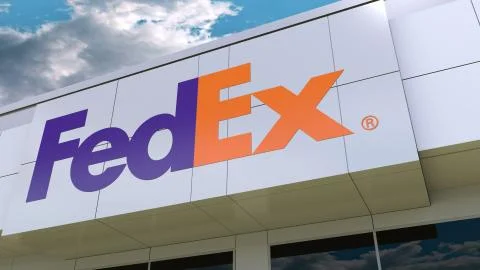 FedEx logo on the modern building facade. Editorial 3D rendering Stock Illustration