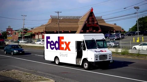 FedEx shipping mail packages delivery truck man, highway traffic 스톡 동영상 81527074