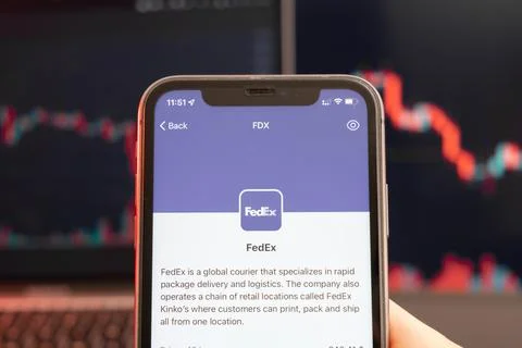 FedEx stock price decrease on the trading market with downtrend line graph bar 스톡 사진