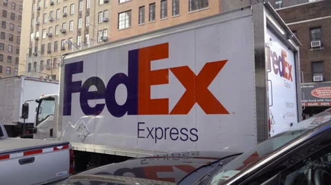 FedEx truck driving in slow motion on 7th Avenue traffic in Chelsea in NYC  Stock Footage 59088053