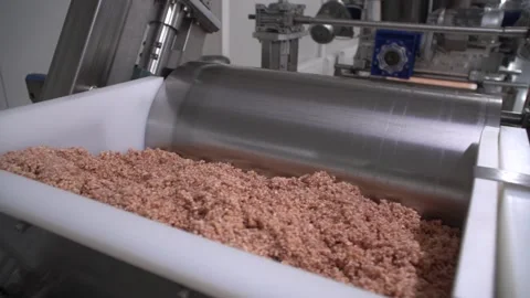 Feed side of grey metallic nut bar making machine, moving close up Stock Footage 163713676