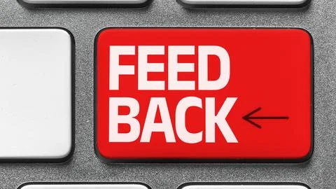 Feedback button on a computer keyboard at a desk Foto stock