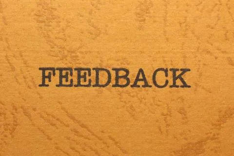 Feedback Text on Vintage Paper Background Stock Photos