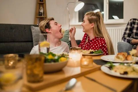 Feeding Partner Spaghetti at Dinner Stockfoto's