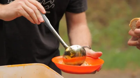 Feeding the volunteers Stock Footage 33878262